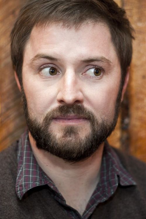 Key visual of Adam Cayton-Holland