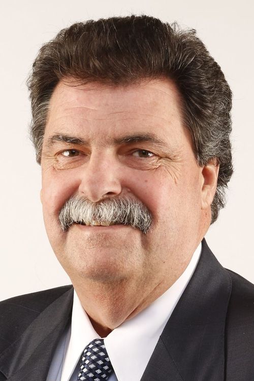 Key visual of Mike Helton