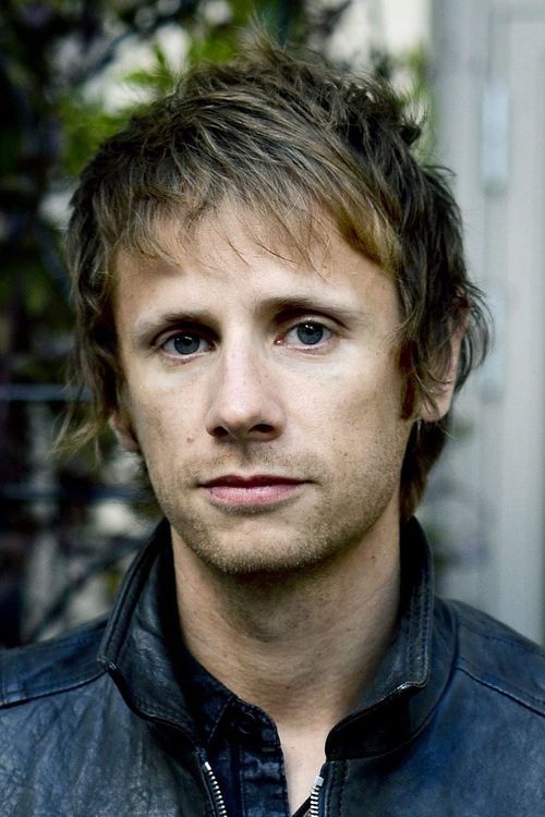 Key visual of Dominic Howard