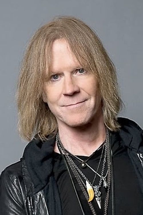 Key visual of Tom Hamilton