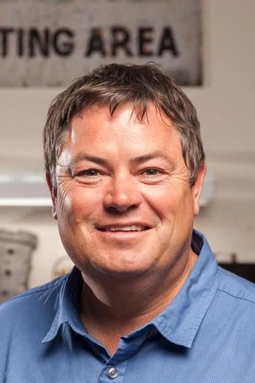 Key visual of Mike Brewer