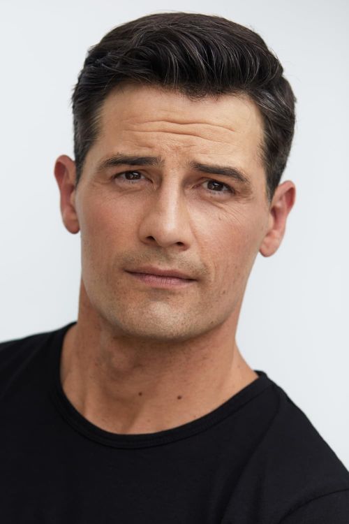 Key visual of Enver Gjokaj