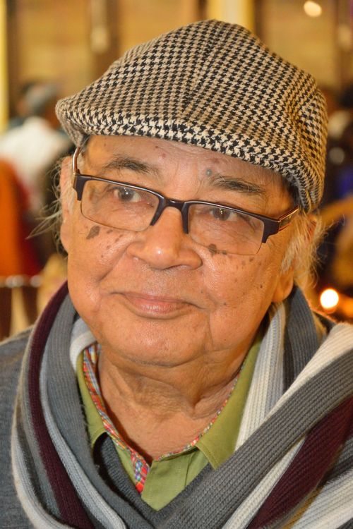 Key visual of Manoj Mitra