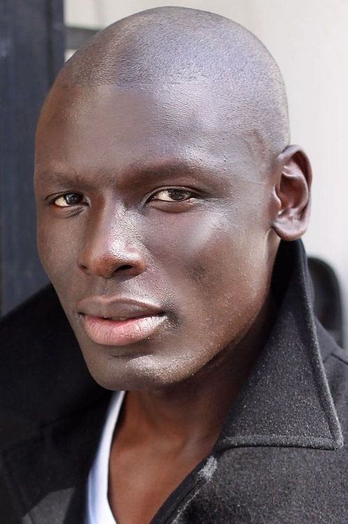 Key visual of Robert Okumu