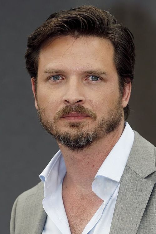 Key visual of Aden Young